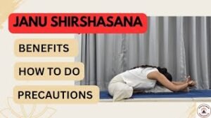 practicing Janu Shirshasana yoga pose on a mat