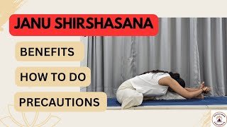 practicing Janu Shirshasana yoga pose on a mat