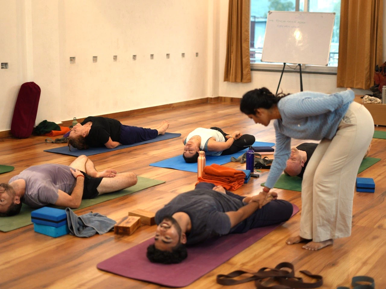 Doing asana during 200 hour yoga teacher training course at Jeevatman Yogshala