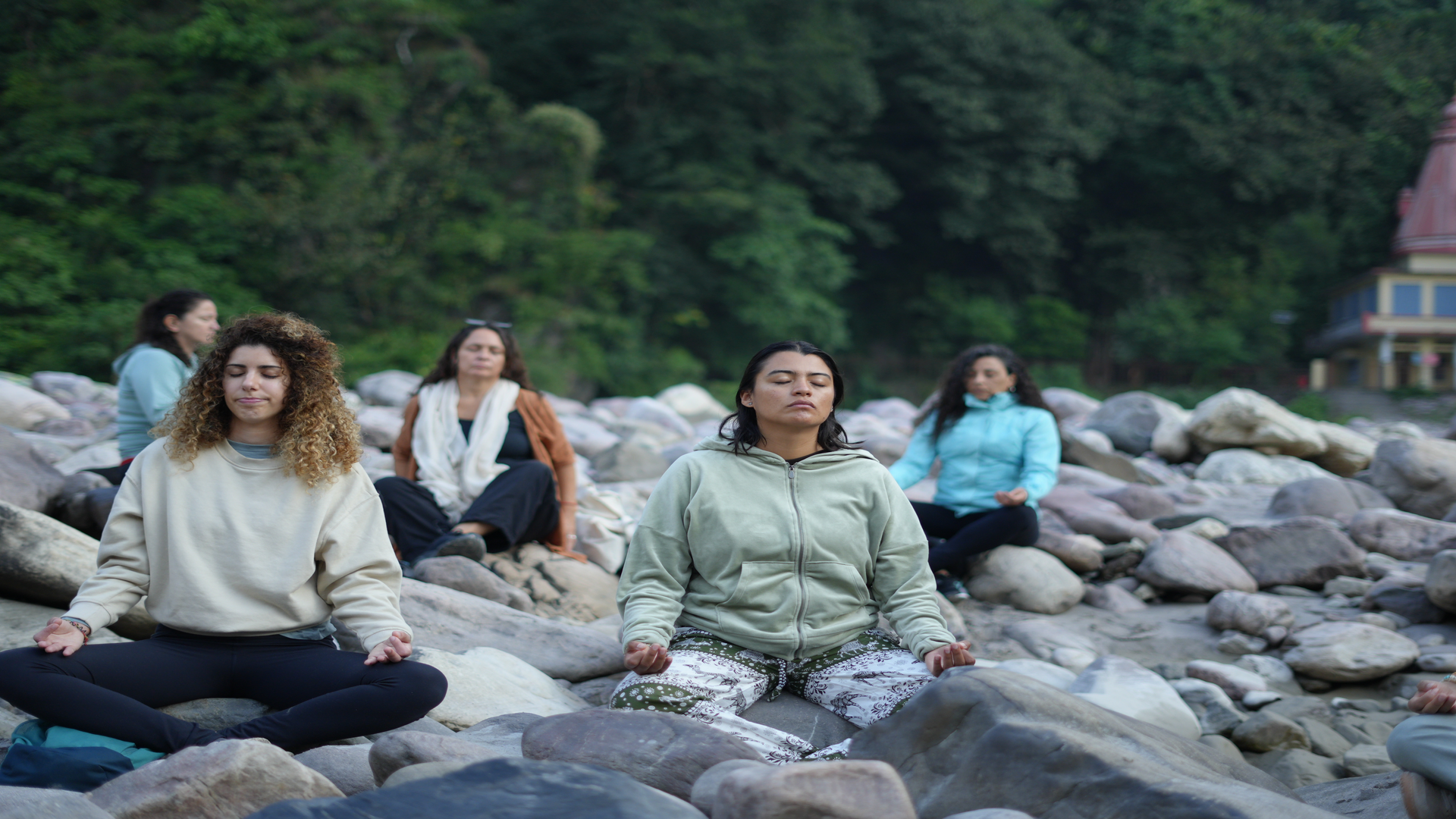 Sunrise yoga session by the Ganga at Jeevatman Yogashala