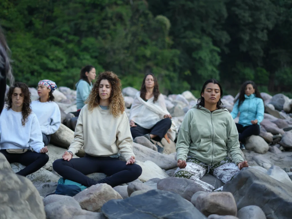 meditation near ganga at vasisth cave during retreat in rishikesh