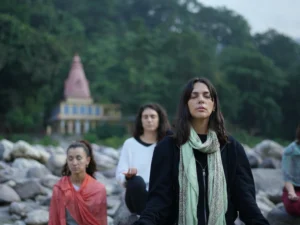 Doind Meditation near ganga river during yoga teacher training course in Rishikesh at Jeevatman Yogshala