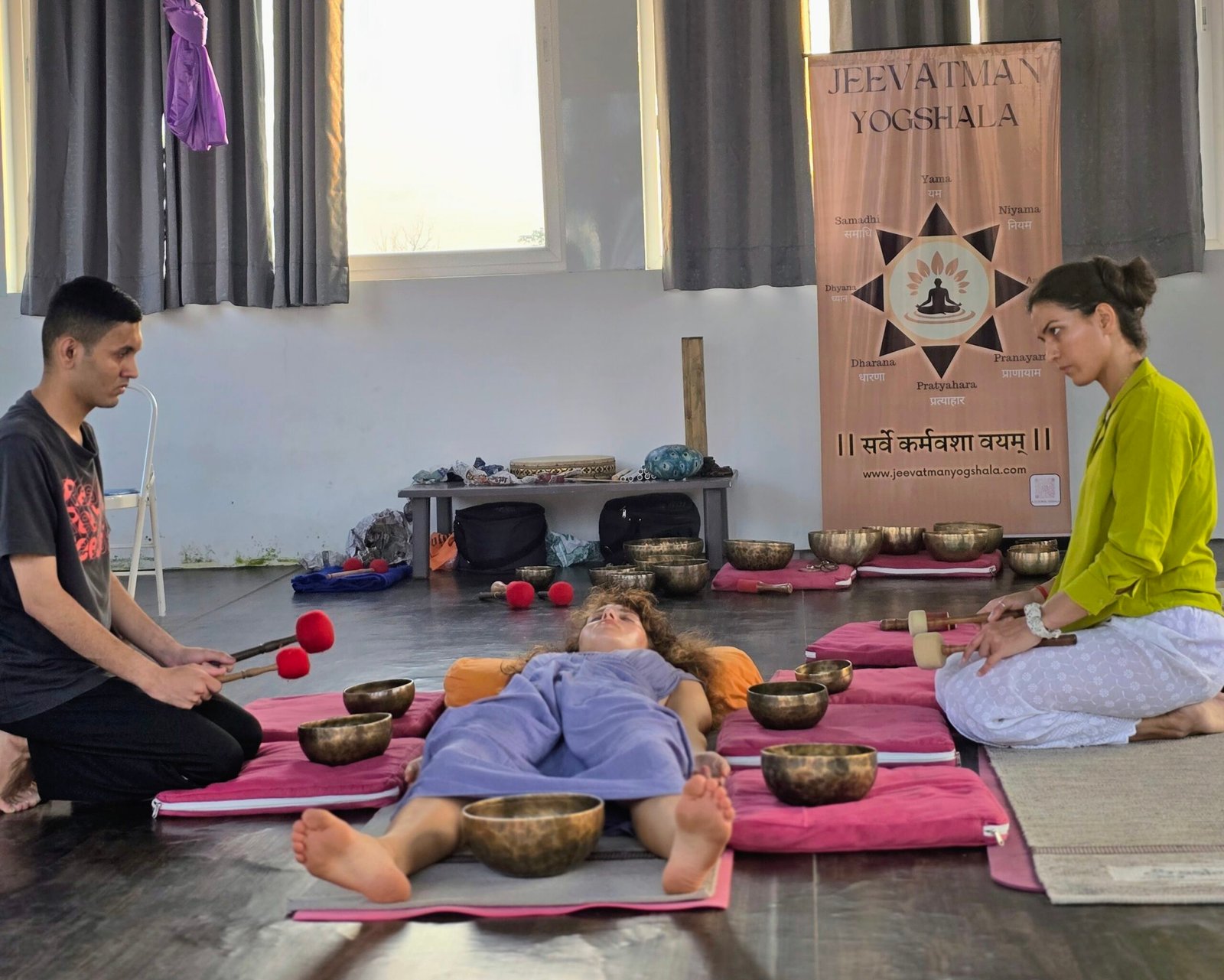 Sound healing therapy session with Tibetan singing bowls at Jeevatman Yogshala