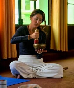 Meditation with Tibetan singing bowl for sound healing practice
