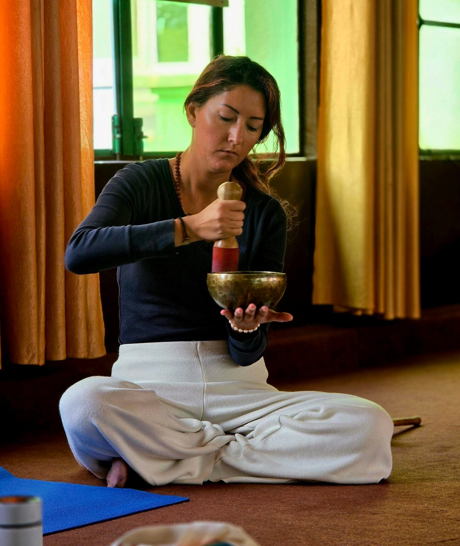 Meditation with Tibetan singing bowl for sound healing practice