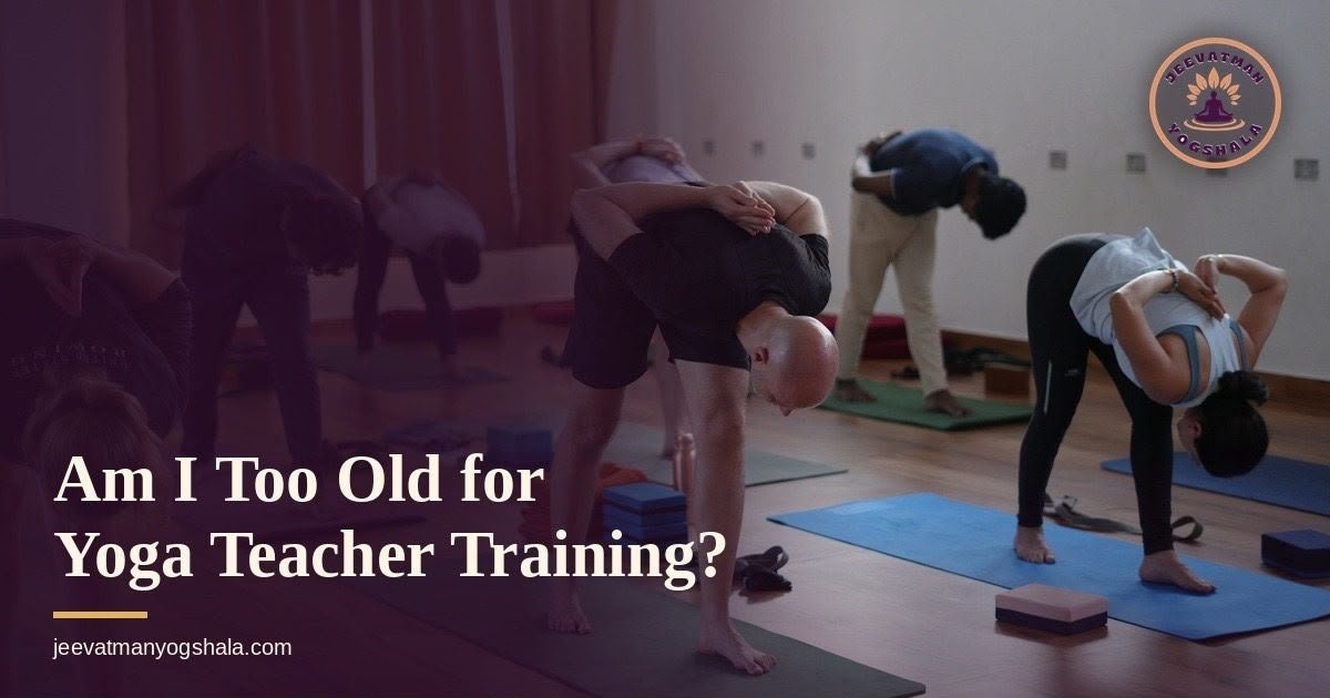 Am I Too Old for Yoga Teacher Training? 1 Older and younger students stretching together in a yoga teacher training class in Rishikesh, illustrating that age is not a barrier to training